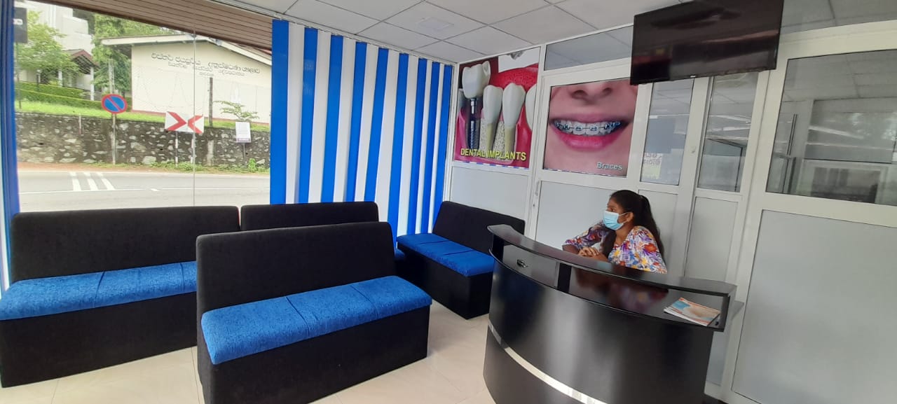 Blue and black seating beside the reception desk